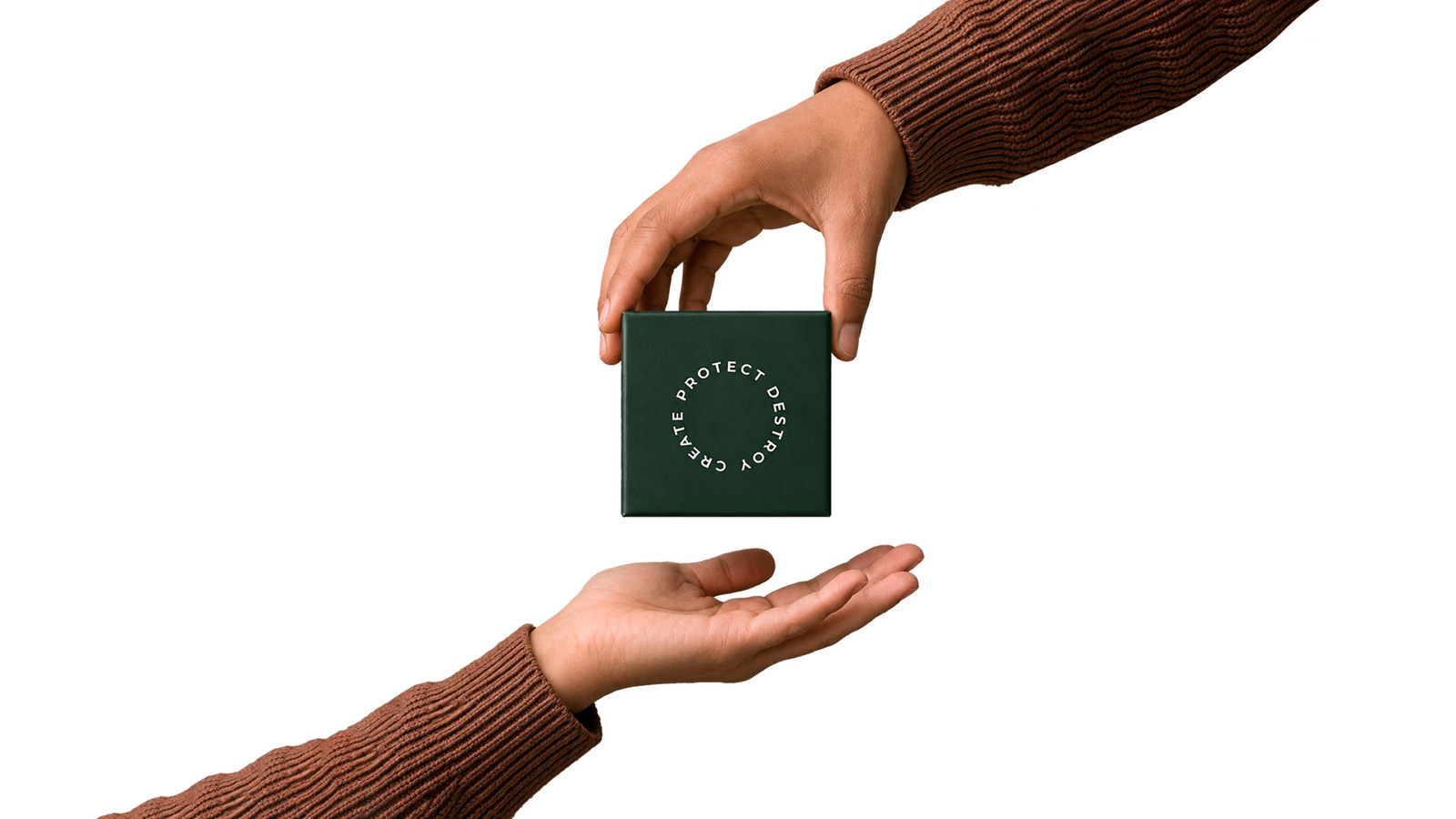 One hand passing the Create Protect Destroy box to another
